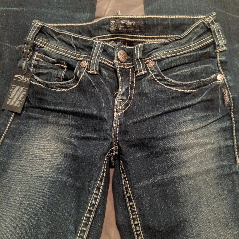 Never worn Silver jeans